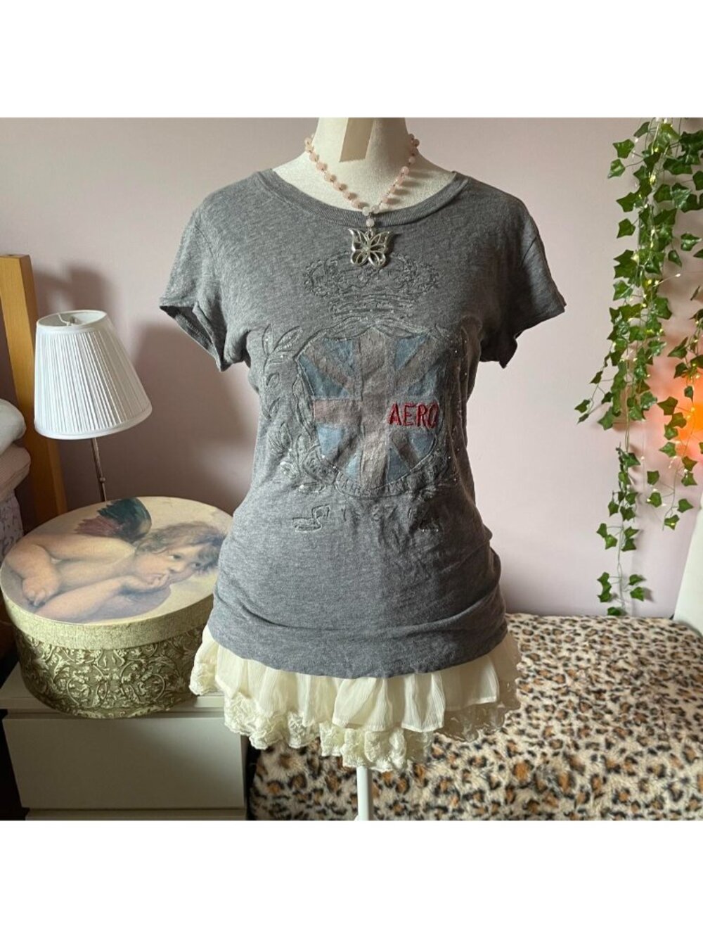 Grey 2000s Aeropostale tee with crown and sequin details